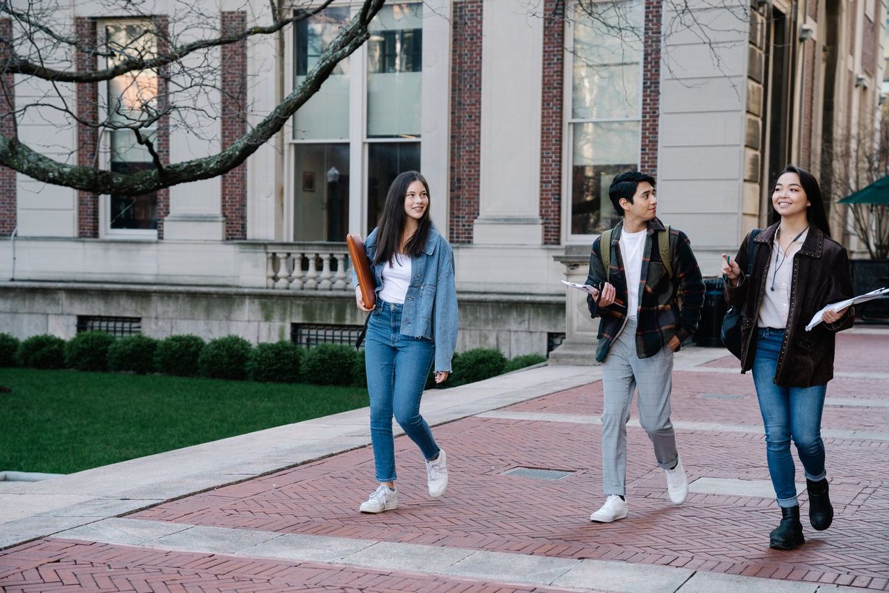 Students walking across a university campus - the population the fee would hit.