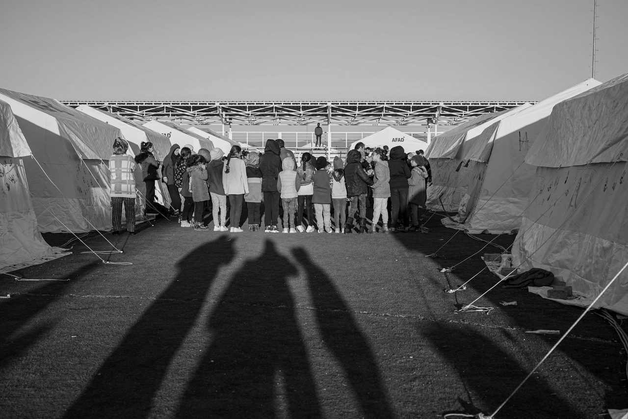 Emergency tents erected by relief agencies near the frontier.