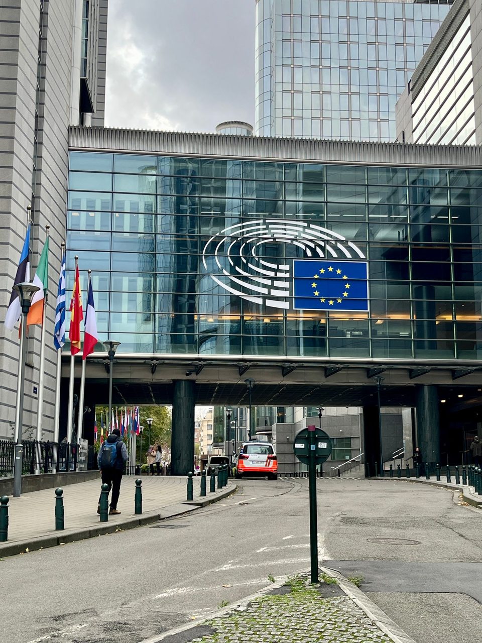 EU flags outside a government building - the AI Act's enforcement era begins on 2 August 2026.