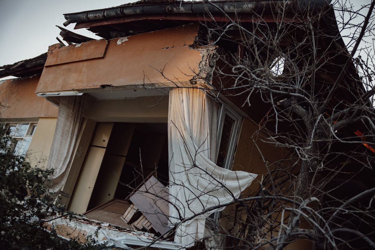 A house destroyed by the tremor β one of thousands damaged across the prefecture.