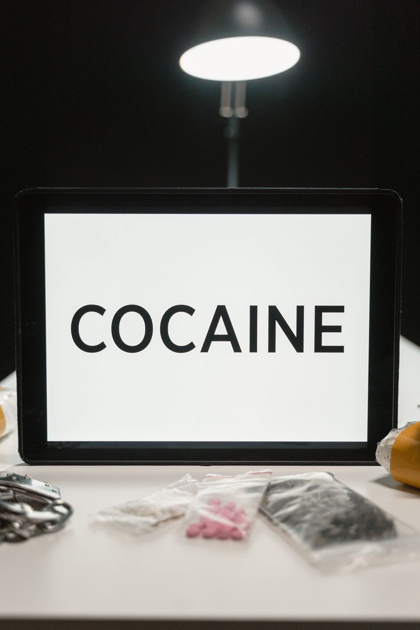 Cocaine laid out on a table โ the scale of the largest seizure in Liberian history.