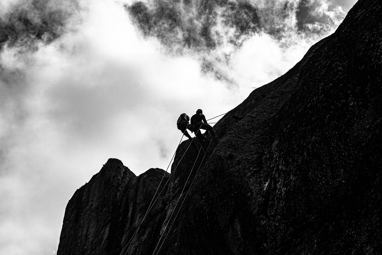 Mountaineers climbing with ropes — the kind of expedition caught in the Broad Peak avalanche.
