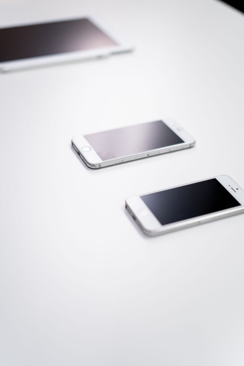 An iPhone on a table - the product that anchors Apple revenue.
