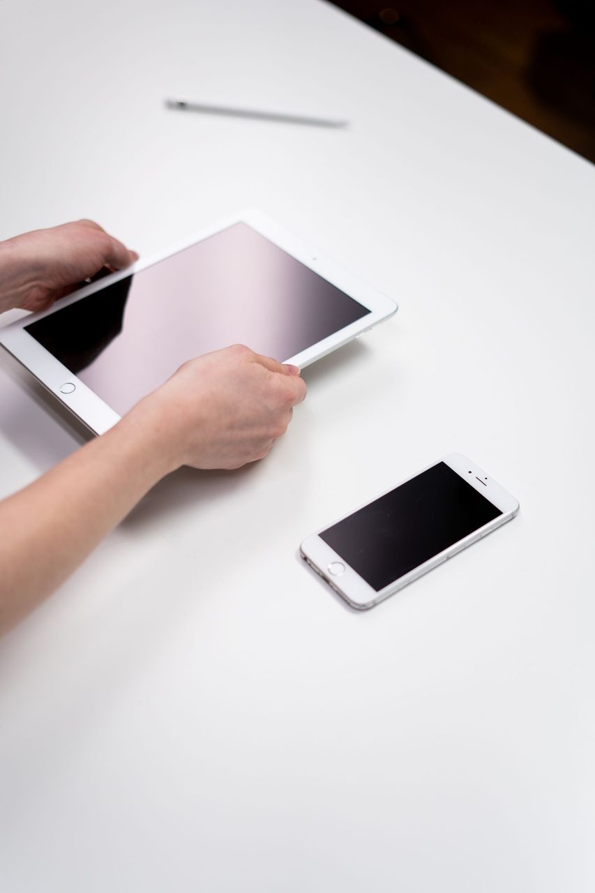 A phone in hand - consumer demand remains the swing factor for the company.