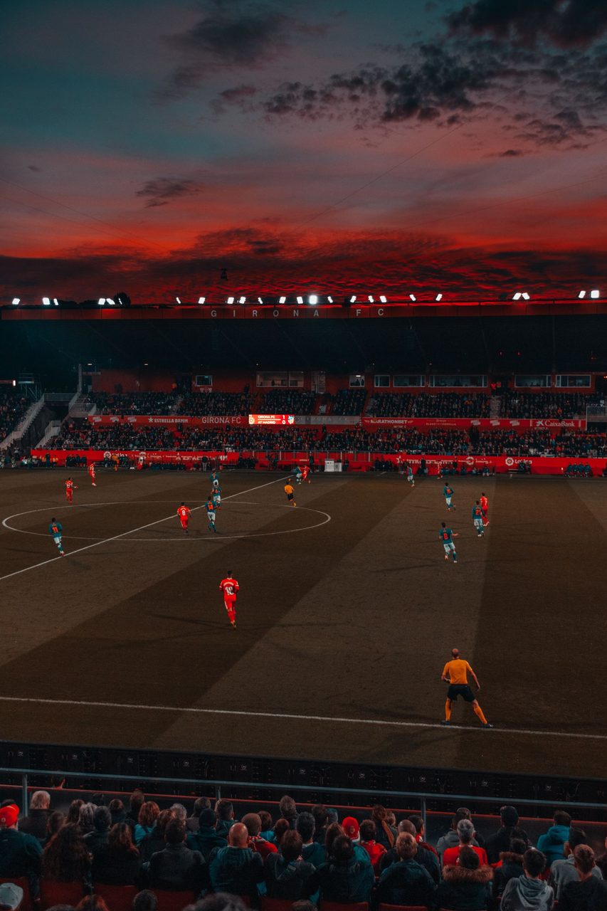 A football match under stadium lights โ the prize FIFA wanted to share with private investors.