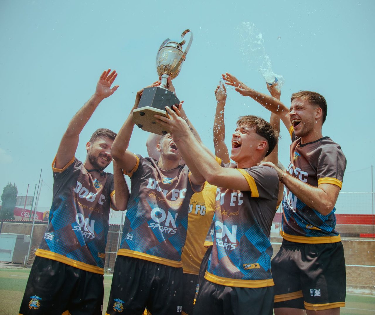 Celebration on the pitch - the trophy was followed by ugly scenes between the two teams.