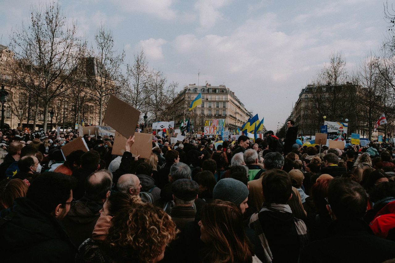 A rally crowd gathers on the streets before the police ban took effect.